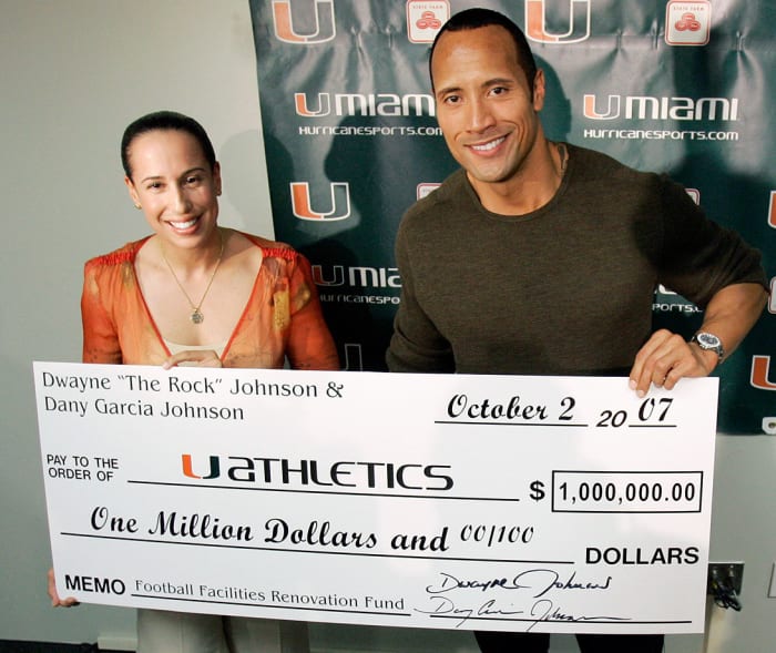 2007-Dwayne-The-Rock-Johnson-ex-wife-Dany-Garcia-Miami-donation.jpg
